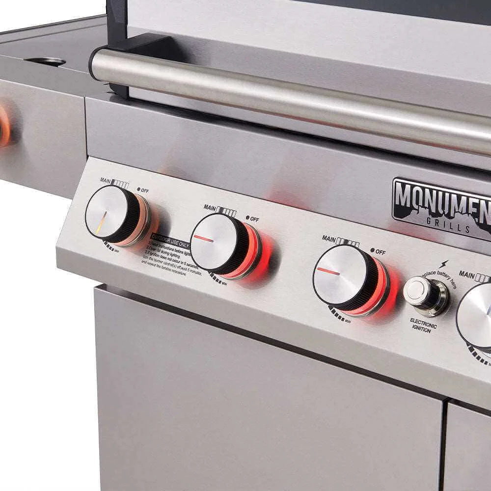 Close-up of a grill control panel with visible brand name 'Monument Grills Denali 605'.
