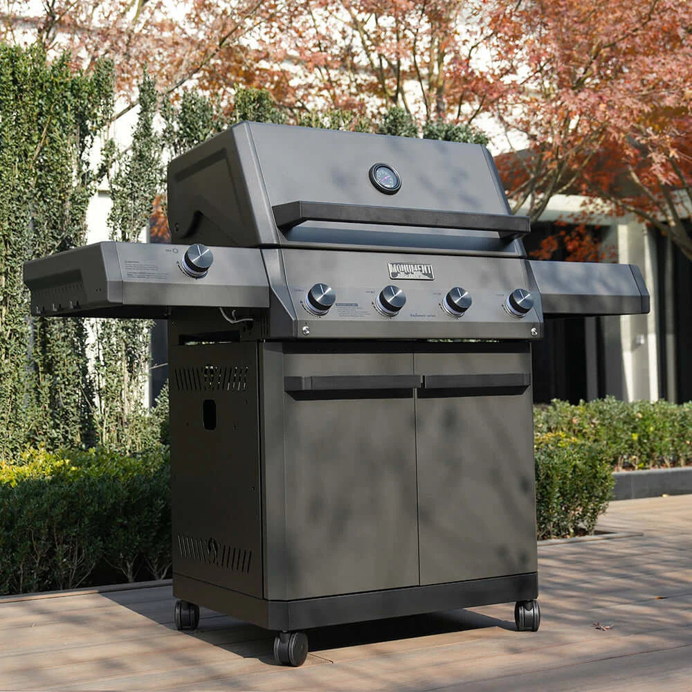 Monument Grills Eminence 425 on a wooden deck with trees