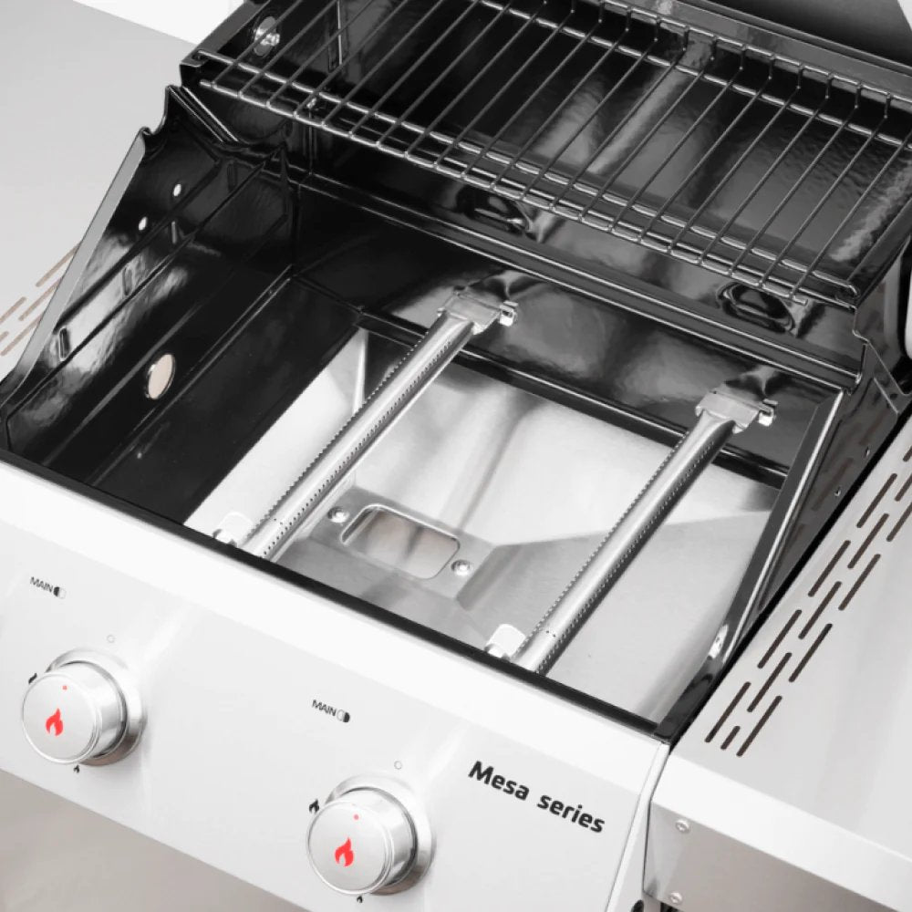Close-up of a Monument Grills Mesa 200S gas grill with open lid showing grates and burner system.