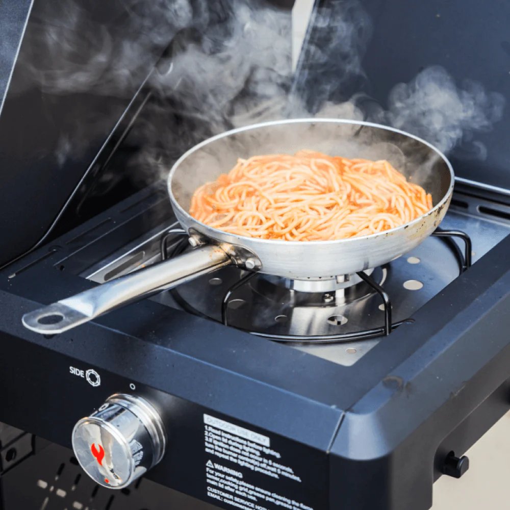 Monument Grills Mesa 325 - Cooking spaghetti in a pan on a portable stove