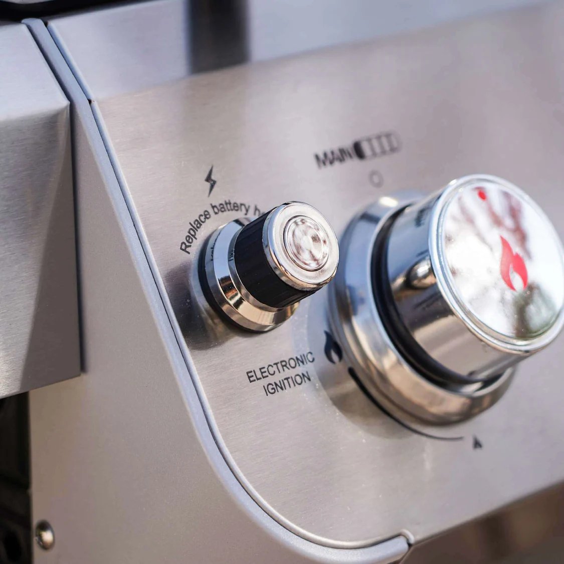 Close-up of a gas Monument Grills Mesa 415BZ control panel with electronic ignition