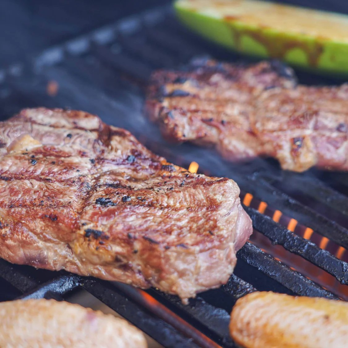 Grilled meat and vegetables on a Monument Grills Mesa 415BZ