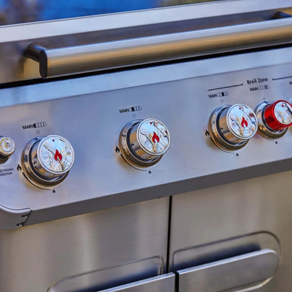 Close-up of a stainless steel Monument Grills Mesa 415BZ with control knobs