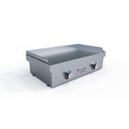 Stainless steel griddle with control knobs on a white background