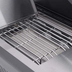 Monument Grills Eminence 405 - Close-up of a grill with a metal grate inside an oven.