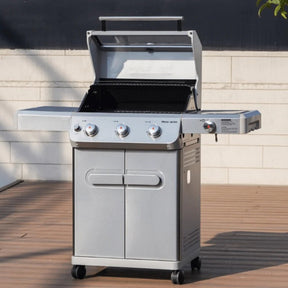 Stainless steel Monument Grills Mesa 305 placed on a wooden deck with a neutral background.