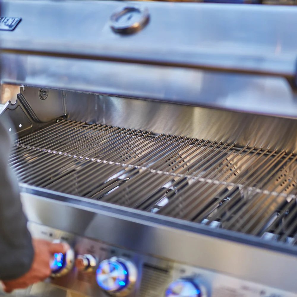 Close-up of a stainless steel grill with visible brand name