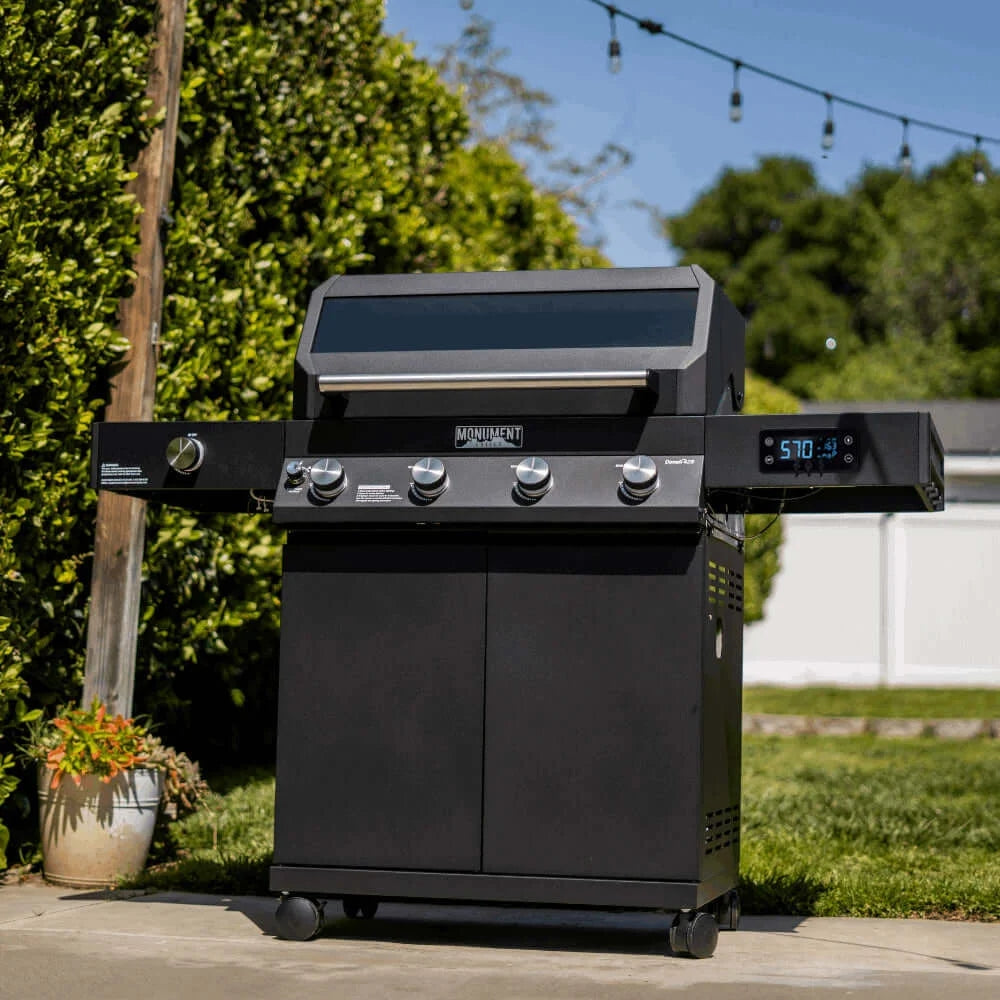 Black barbecue grill with digital display in an outdoor setting