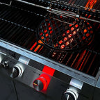 Close-up of a gas grill with glowing hot plates