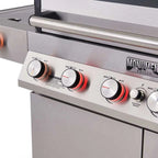Close-up of a grill control panel with visible brand name 'Monument Grills'.