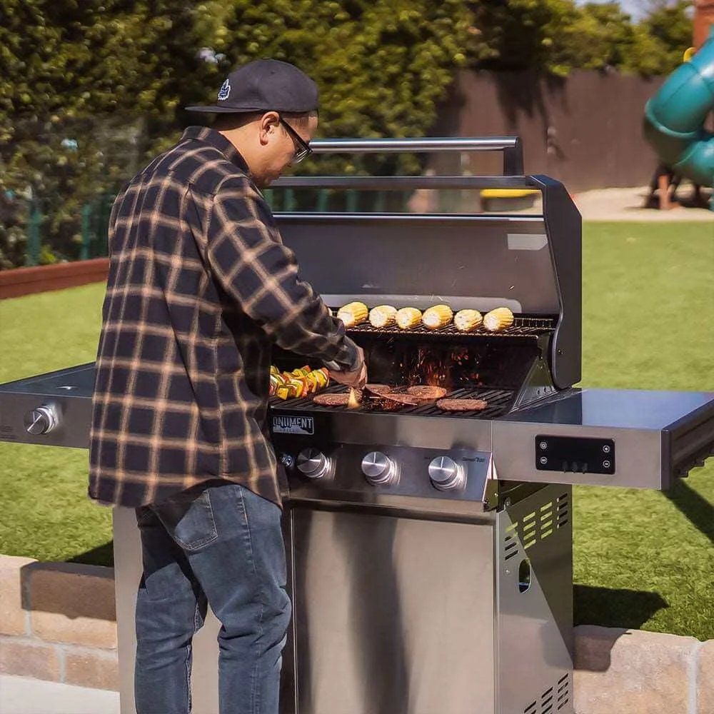 Person grilling outdoors on a sunny day