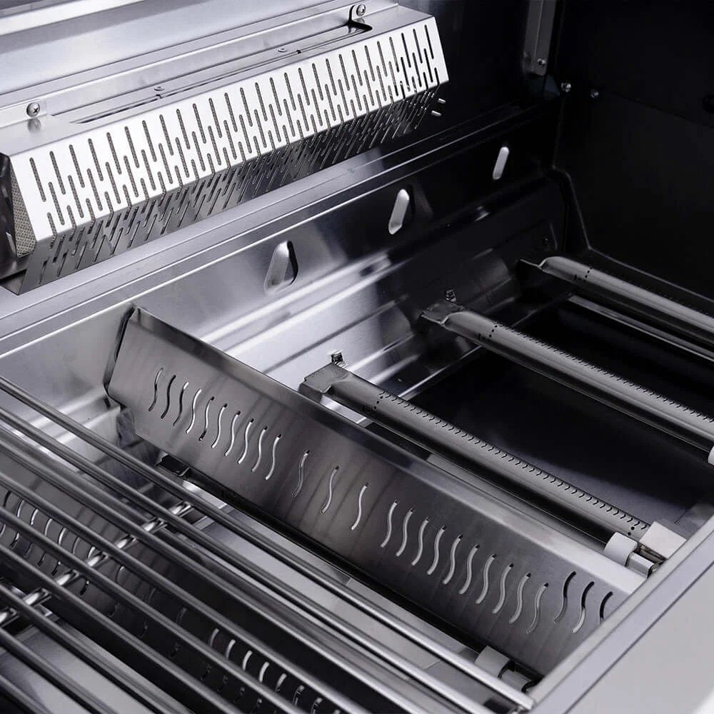 Close-up of a modern gas grill with multiple burners and grates.