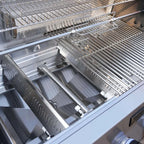 Close-up of a grill with metal racks and components