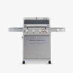 Stainless steel barbecue grill on a white background