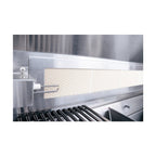 Close-up of a stainless steel kitchen hood and exhaust system.