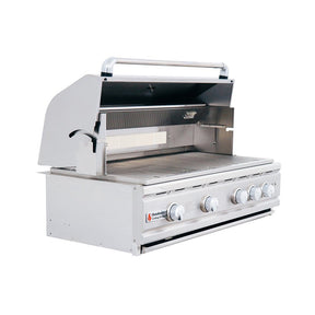 Stainless steel grill with four control knobs on a white background
