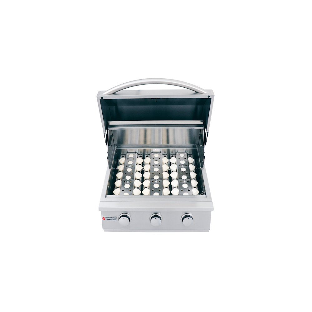 Stainless steel grill with multiple burners on a white background