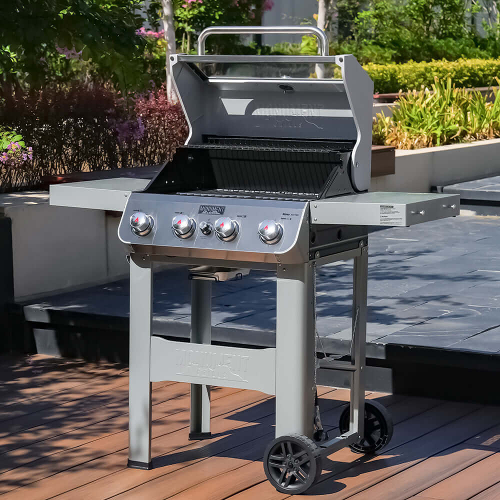 Monument Grills Mesa 400MF stainless gas grill with four burners and glass viewing lid