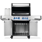 Stainless steel gas grill with blue-lit knobs and open storage compartments