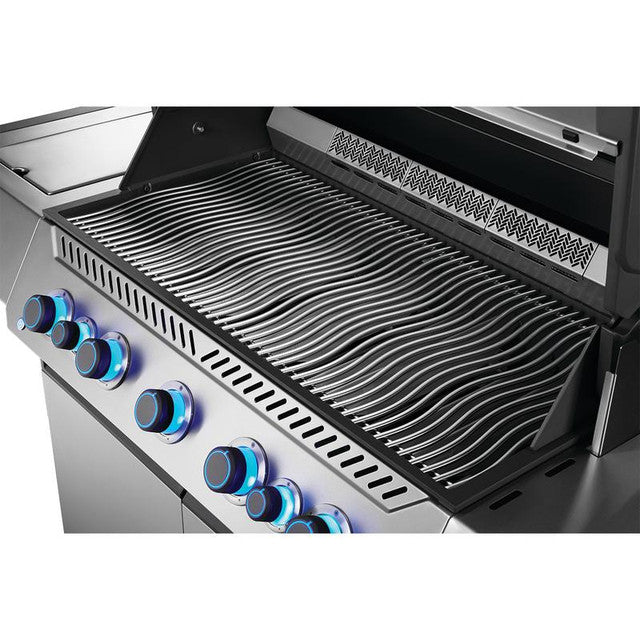 Stainless steel gas grill with blue-lit control knobs and wavy grates for outdoor BBQ cooking
