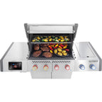 Stainless steel gas grill with steaks, veggies, and digital control panel for outdoor BBQ cooking