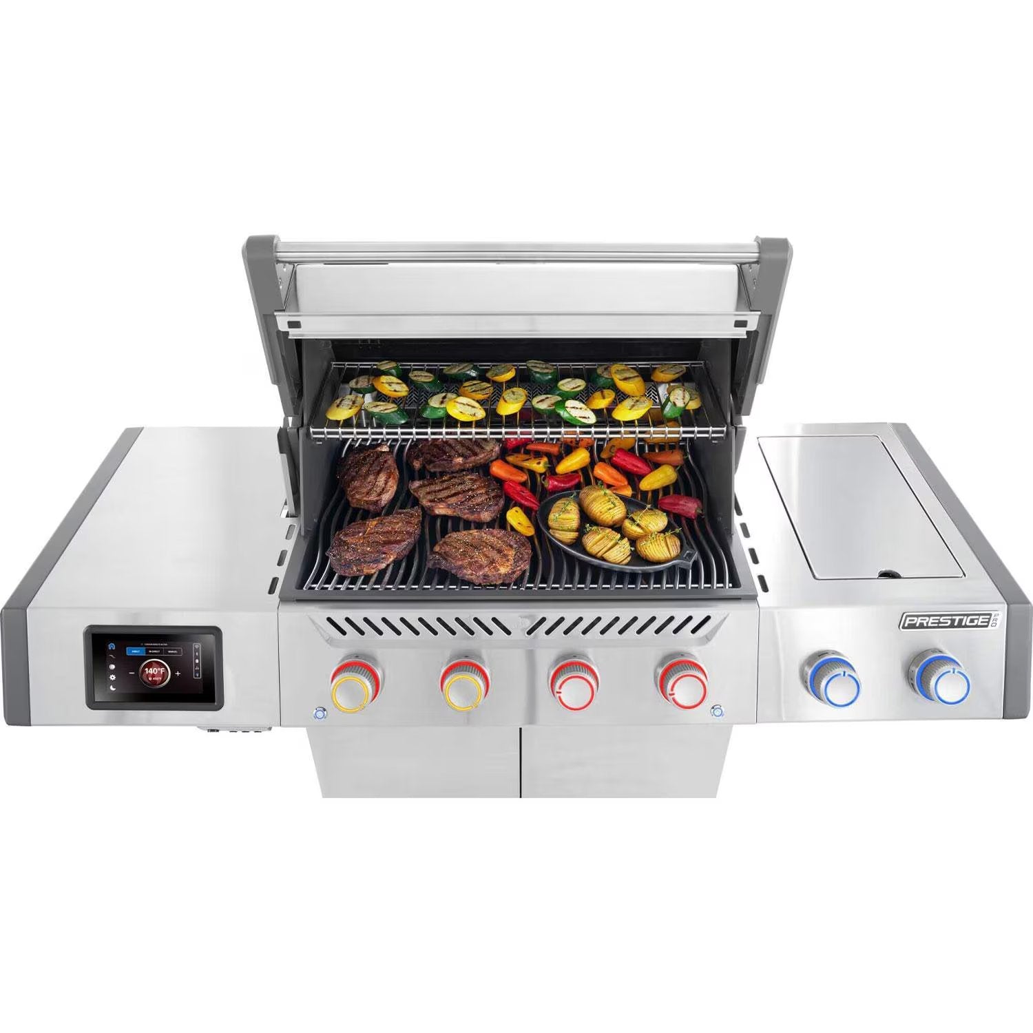 Stainless steel gas grill with steaks, veggies, and digital control panel for outdoor BBQ cooking